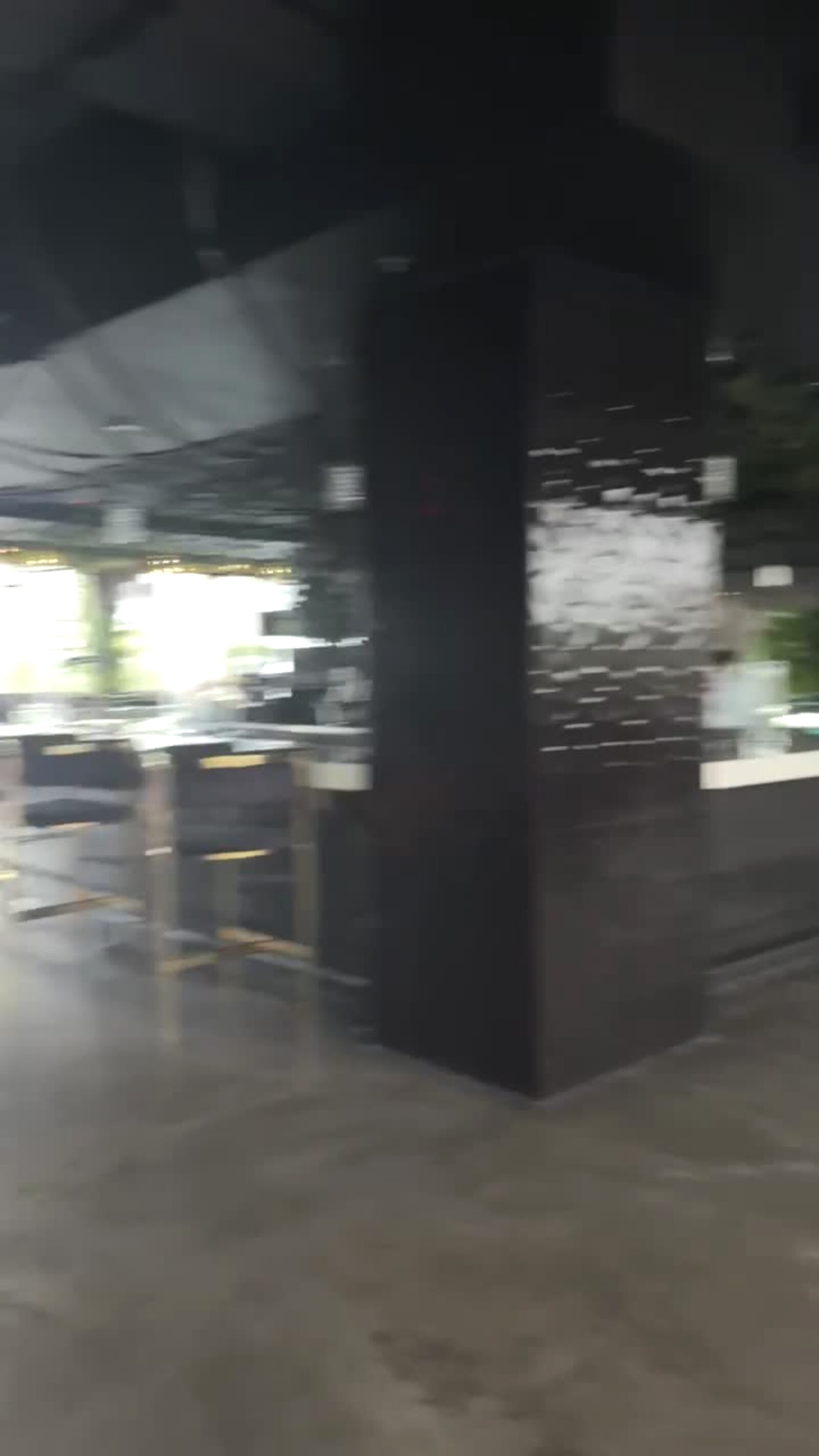 Dark stone bar in a high-end club space in Houston